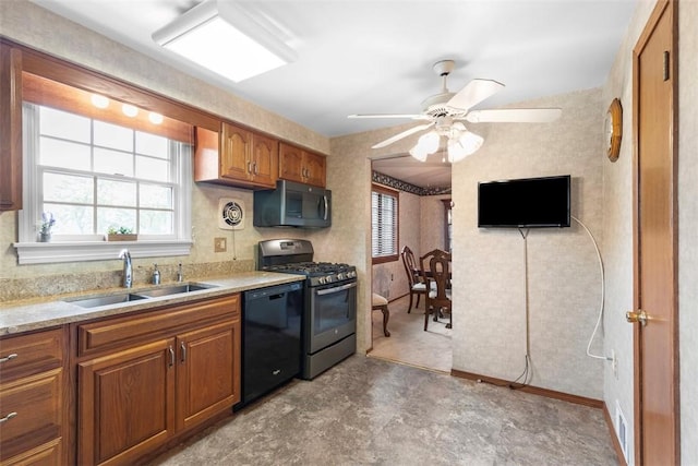 645 Dewalt Dr, Baldwin Twp, PA 15234 - kitchen with black appliances, a sink, brown cabinetry, and ceiling fan