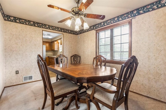645 Dewalt Dr, Baldwin Twp, PA 15234 - dining room with carpet flooring, a ceiling fan, healthy amount of natural light, baseboards, and wallpapered walls