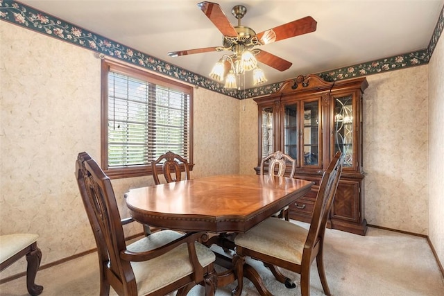 645 Dewalt Dr, Baldwin Twp, PA 15234 - dining space with light colored carpet, ceiling fan, baseboards, and wallpapered walls