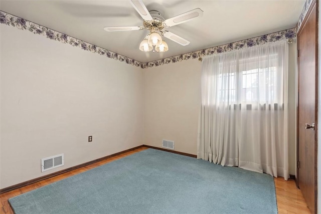 645 Dewalt Dr, Baldwin Twp, PA 15234 - unfurnished room with a ceiling fan, light wood-style floors, and baseboards