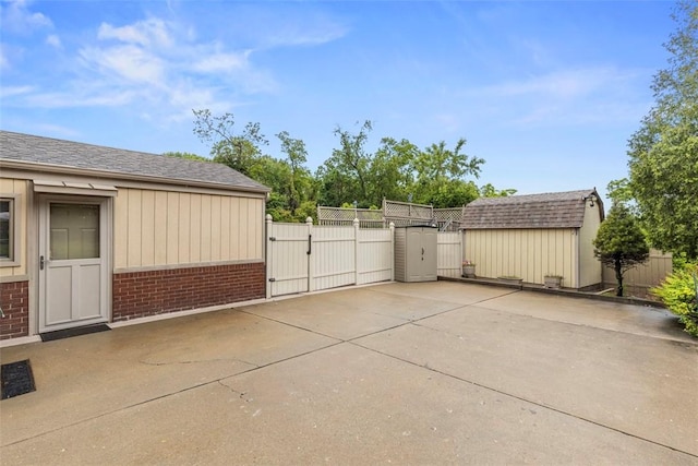 645 Dewalt Dr, Baldwin Twp, PA 15234 - view of patio / terrace with a gate