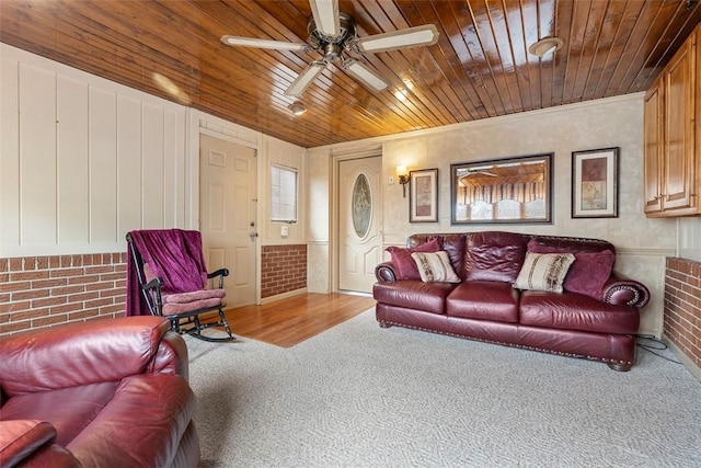 645 Dewalt Dr, Baldwin Twp, PA 15234 - carpeted living area featuring a ceiling fan, wood ceiling, and brick wall