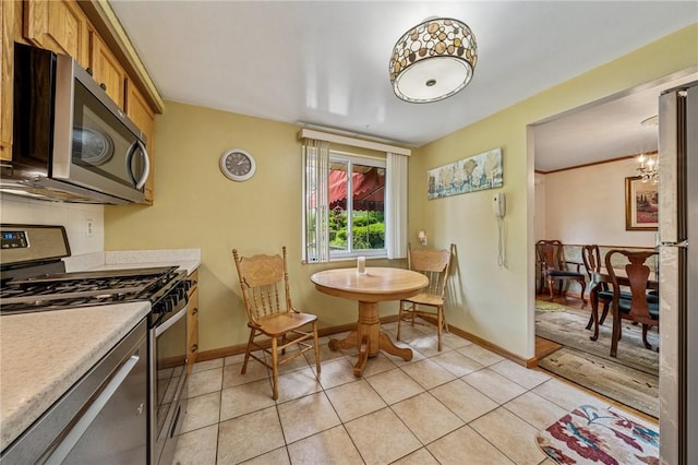 422 Mower Dr, Plum Boro, PA 15239 - dining area featuring light tile patterned floors and baseboards
