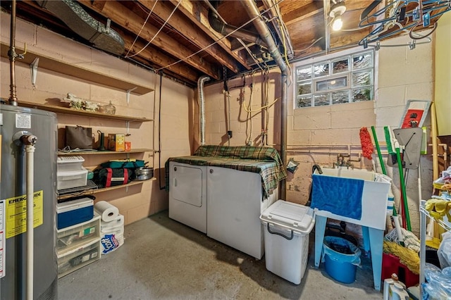 422 Mower Dr, Plum Boro, PA 15239 - unfinished basement featuring washer and clothes dryer, gas water heater, and concrete block wall