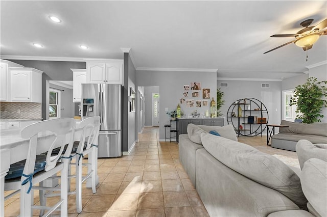 122 Hunter Dr, Cranberry Twp, PA 16066 - living room featuring crown molding, a ceiling fan, recessed lighting, light tile patterned floors, and baseboards
