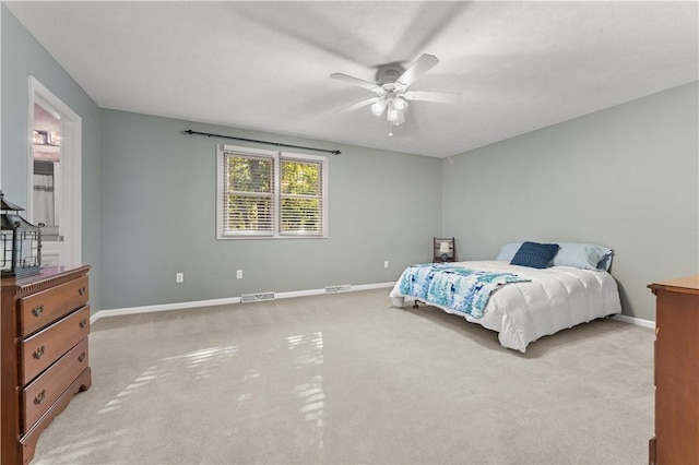 122 Hunter Dr, Cranberry Twp, PA 16066 - bedroom featuring light carpet, baseboards, and a ceiling fan