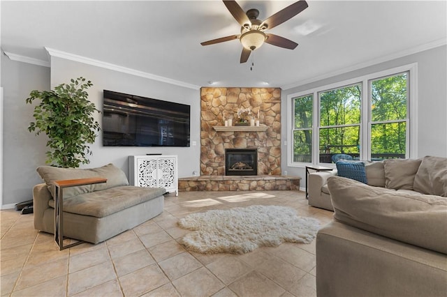 122 Hunter Dr, Cranberry Twp, PA 16066 - living area with ornamental molding, ceiling fan, tile patterned flooring, a stone fireplace, and baseboards