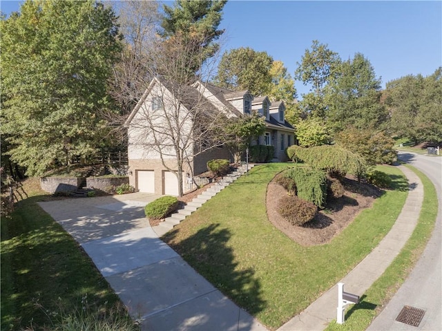 122 Hunter Dr, Cranberry Twp, PA 16066 - cape cod home featuring concrete driveway, an attached garage, and a front yard