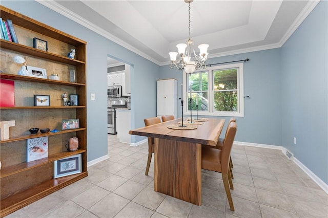 122 Hunter Dr, Cranberry Twp, PA 16066 - dining space with light tile patterned floors, a chandelier, a raised ceiling, baseboards, and ornamental molding