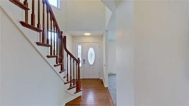 373 Cherokee Dr, Chippewa Twp, PA 15010 - foyer entrance featuring healthy amount of natural light, stairway, hardwood / wood-style flooring, a towering ceiling, and baseboards