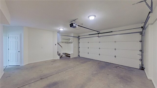 373 Cherokee Dr, Chippewa Twp, PA 15010 - garage featuring a garage door opener