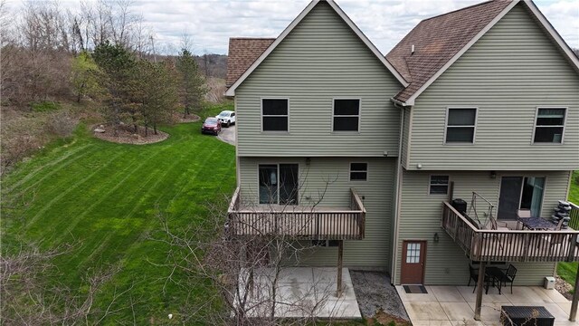 373 Cherokee Dr, Chippewa Twp, PA 15010 - rear view of house featuring a lawn, a patio area, and a wooden deck