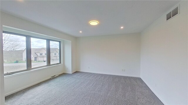 373 Cherokee Dr, Chippewa Twp, PA 15010 - spare room featuring carpet floors, recessed lighting, and baseboards