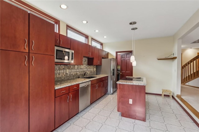 4701 Logan Ferry Rd, Murrysville, PA 15668 - kitchen with appliances with stainless steel finishes, a sink, light flooring, decorative backsplash, and recessed lighting