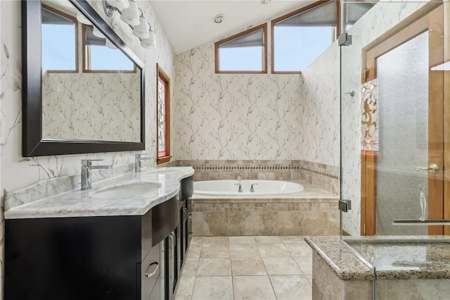 4701 Logan Ferry Rd, Murrysville, PA 15668 - full bathroom featuring vanity, a garden tub, healthy amount of natural light, vaulted ceiling, and a stall shower