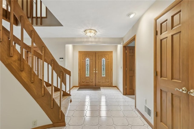 4701 Logan Ferry Rd, Murrysville, PA 15668 - foyer entrance with stairs, baseboards, and light floors
