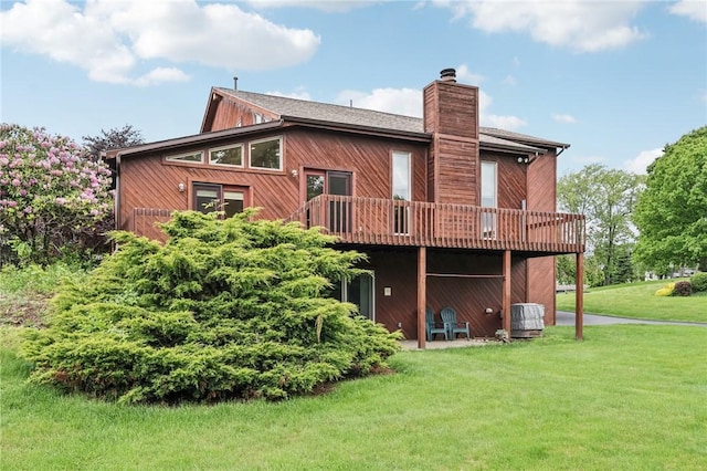 4701 Logan Ferry Rd, Murrysville, PA 15668 - rear view of house featuring a chimney, a lawn, and a wooden deck