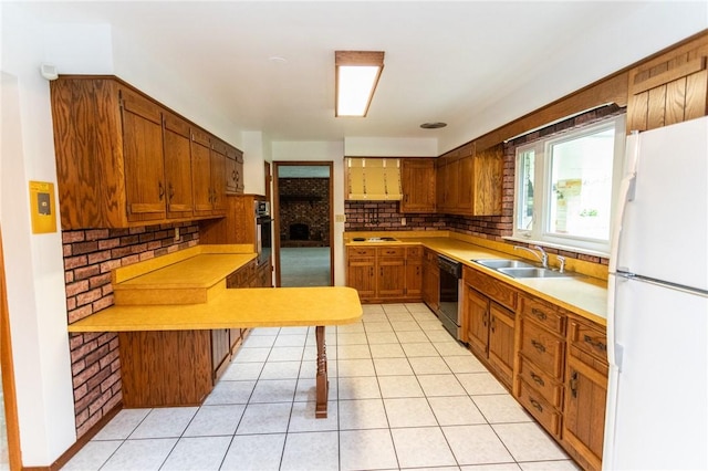 240 Connellsville St, Dunbar, PA 15431 - kitchen featuring freestanding refrigerator, a sink, dishwasher, tasteful backsplash, and light countertops