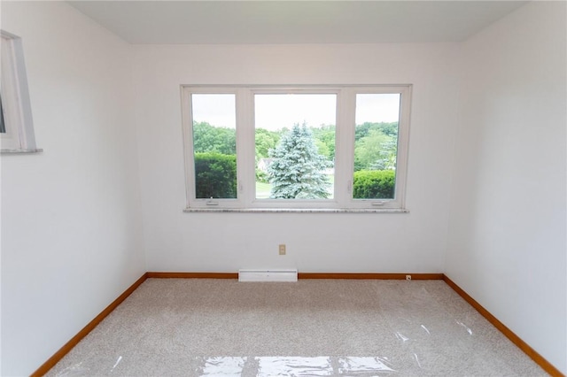 240 Connellsville St, Dunbar, PA 15431 - carpeted spare room featuring baseboards and a baseboard radiator