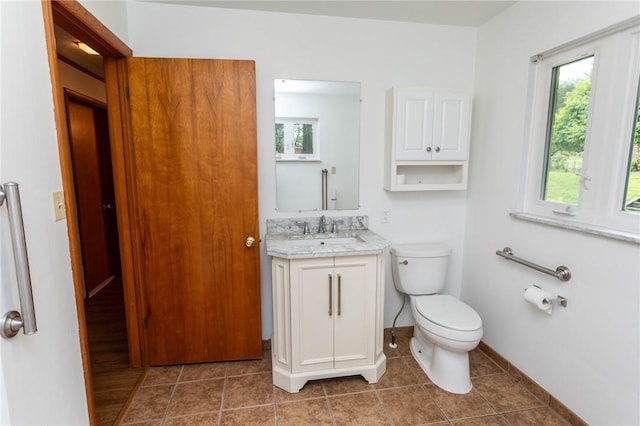 240 Connellsville St, Dunbar, PA 15431 - bathroom featuring vanity, toilet, baseboards, and tile patterned floors