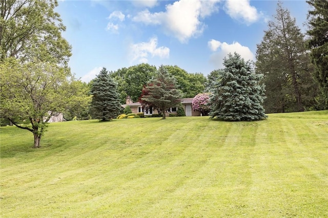 240 Connellsville St, Dunbar, PA 15431 - view of grassy yard with a garage