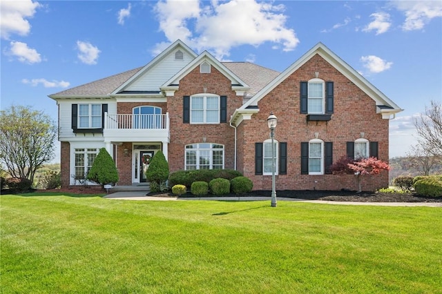 805 Saddleback Ct, Hempfield Twp Wml, PA 15601 - colonial home with brick siding, a balcony, and a front lawn