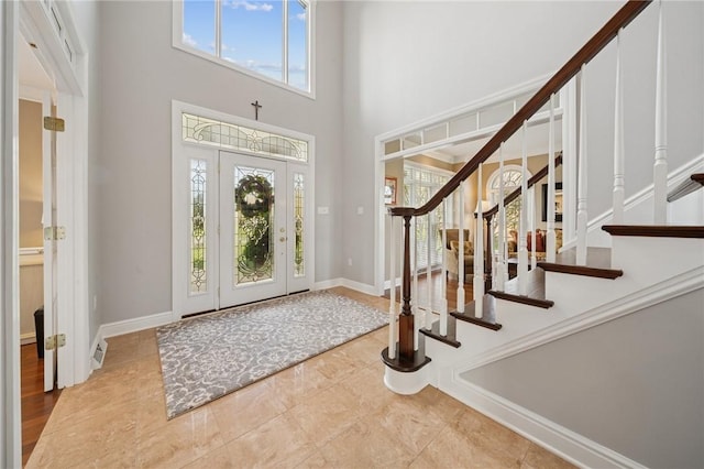 805 Saddleback Ct, Hempfield Twp Wml, PA 15601 - foyer with plenty of natural light, a towering ceiling, and stairway