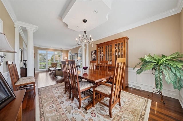 805 Saddleback Ct, Hempfield Twp Wml, PA 15601 - dining area featuring crown molding, wood finished floors, a chandelier, and a wainscoted wall