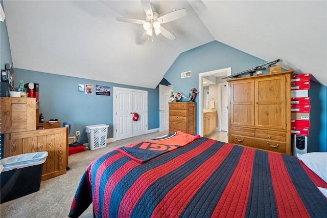 805 Saddleback Ct, Hempfield Twp Wml, PA 15601 - bedroom with vaulted ceiling, light carpet, a ceiling fan, a closet, and ensuite bathroom