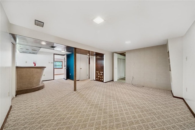 2154 Lancelot Dr, North Huntingdon, PA 15642 - below grade area featuring light carpet and baseboards