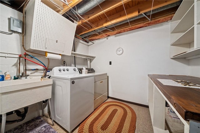 2154 Lancelot Dr, North Huntingdon, PA 15642 - washroom featuring washer and dryer and baseboards