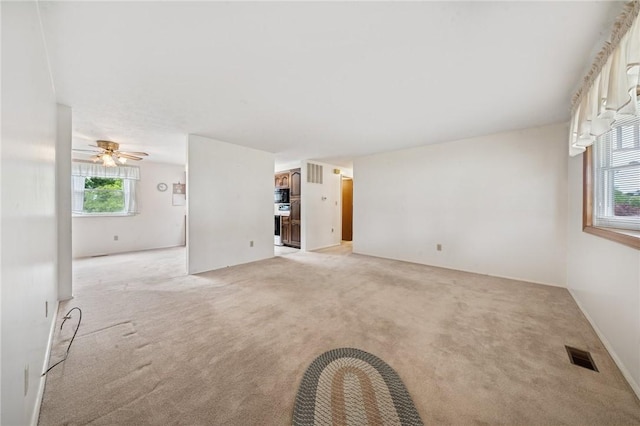 2154 Lancelot Dr, North Huntingdon, PA 15642 - spare room featuring light carpet and a ceiling fan