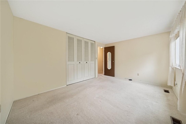 2154 Lancelot Dr, North Huntingdon, PA 15642 - unfurnished bedroom with carpet flooring, a closet, and baseboards
