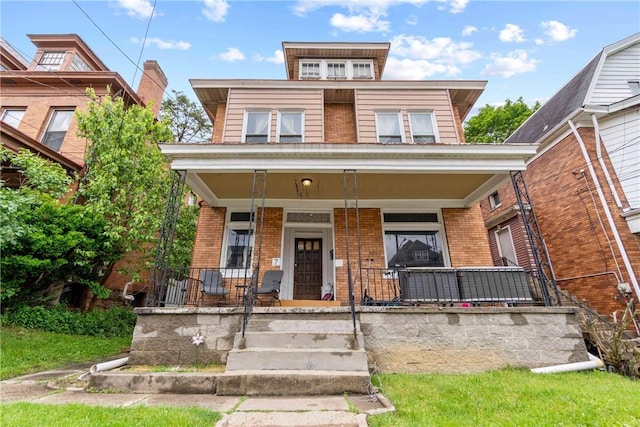 7 Clarion Ave, Ross Twp, PA 15202 - american foursquare style home with brick siding and covered porch