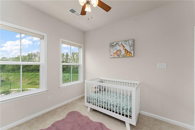 1001 Mohawk Ln, Marshall, PA 16046 - bedroom with baseboards, carpet flooring, a crib, and ceiling fan