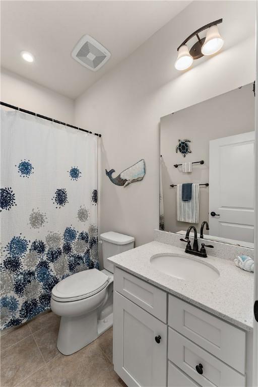 1001 Mohawk Ln, Marshall, PA 16046 - full bathroom featuring vanity, toilet, tile patterned floors, and curtained shower