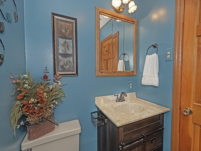 1646 Millers Run Rd, Mount Pleasant Twp Was, PA 15057 - half bath featuring vanity, toilet, and a chandelier
