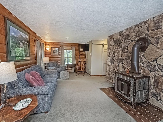 1646 Millers Run Rd, Mount Pleasant Twp Was, PA 15057 - living room with log walls, a wood stove, a textured ceiling, and carpet floors