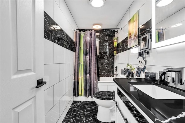 1228 Soles St, Mckeesport, PA 15132 - bathroom featuring marble look tile flooring, toilet, vanity, and shower / tub combo with curtain