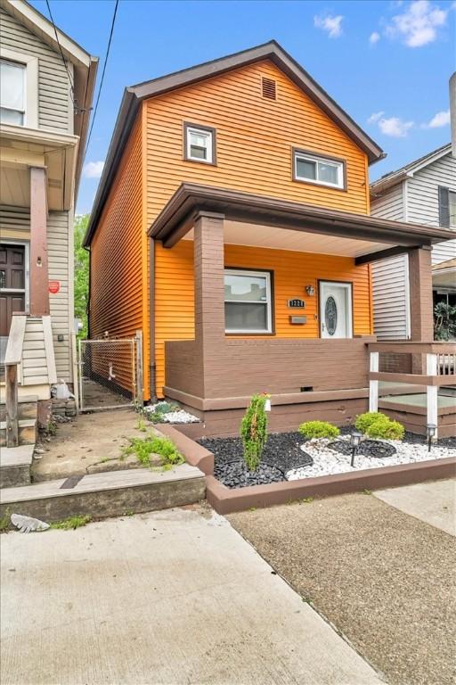 1228 Soles St, Mckeesport, PA 15132 - view of front of home featuring covered porch and a gate