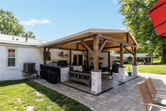22 Green Crescent Dr, South Strabane, PA 15301 - view of patio / terrace featuring an outdoor kitchen and central AC unit