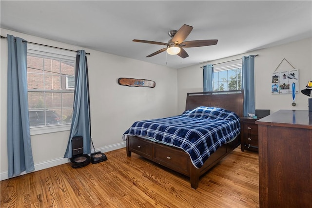 22 Green Crescent Dr, South Strabane, PA 15301 - bedroom featuring wood finished floors, baseboards, and a ceiling fan