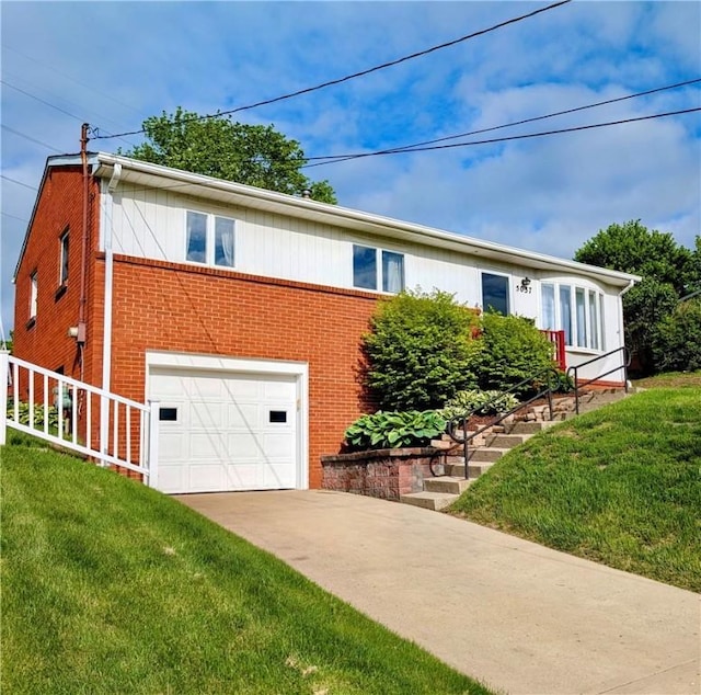 5037 Clifton Dr, Aliquippa, PA 15001 - view of front of property featuring brick siding, an attached garage, concrete driveway, and a front lawn