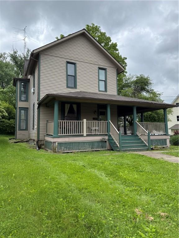 216 Center St, Slippery Rock Boro, PA 16057 - view of front of property featuring a porch and a front yard