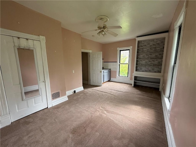 216 Center St, Slippery Rock Boro, PA 16057 - unfurnished bedroom featuring carpet floors, baseboards, and ceiling fan