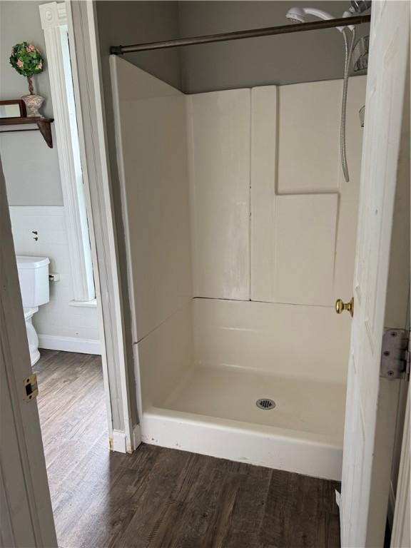 216 Center St, Slippery Rock Boro, PA 16057 - bathroom with toilet, wood finished floors, and a shower stall
