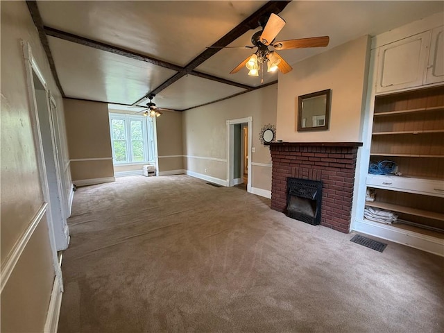 216 Center St, Slippery Rock Boro, PA 16057 - unfurnished living room featuring ceiling fan, carpet, a brick fireplace, and baseboards