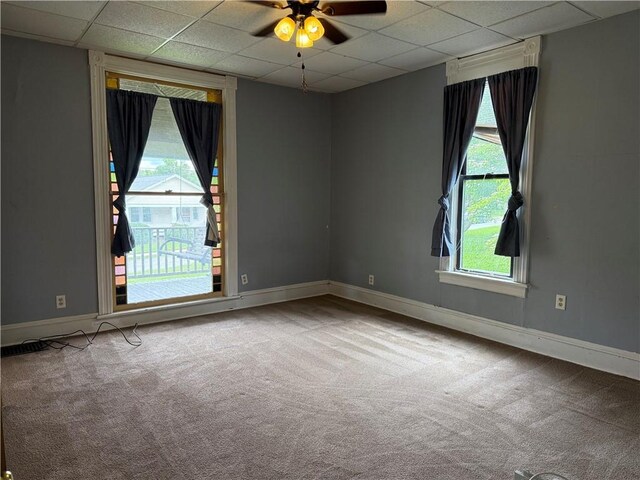 216 Center St, Slippery Rock Boro, PA 16057 - carpeted spare room with a paneled ceiling, ceiling fan, and baseboards