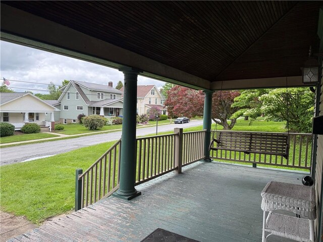 216 Center St, Slippery Rock Boro, PA 16057 - covered porch with a residential view and a yard