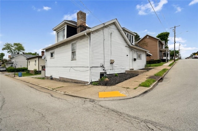 657 Grove St, City Of Greensburg, PA 15601 - view of property exterior with a chimney